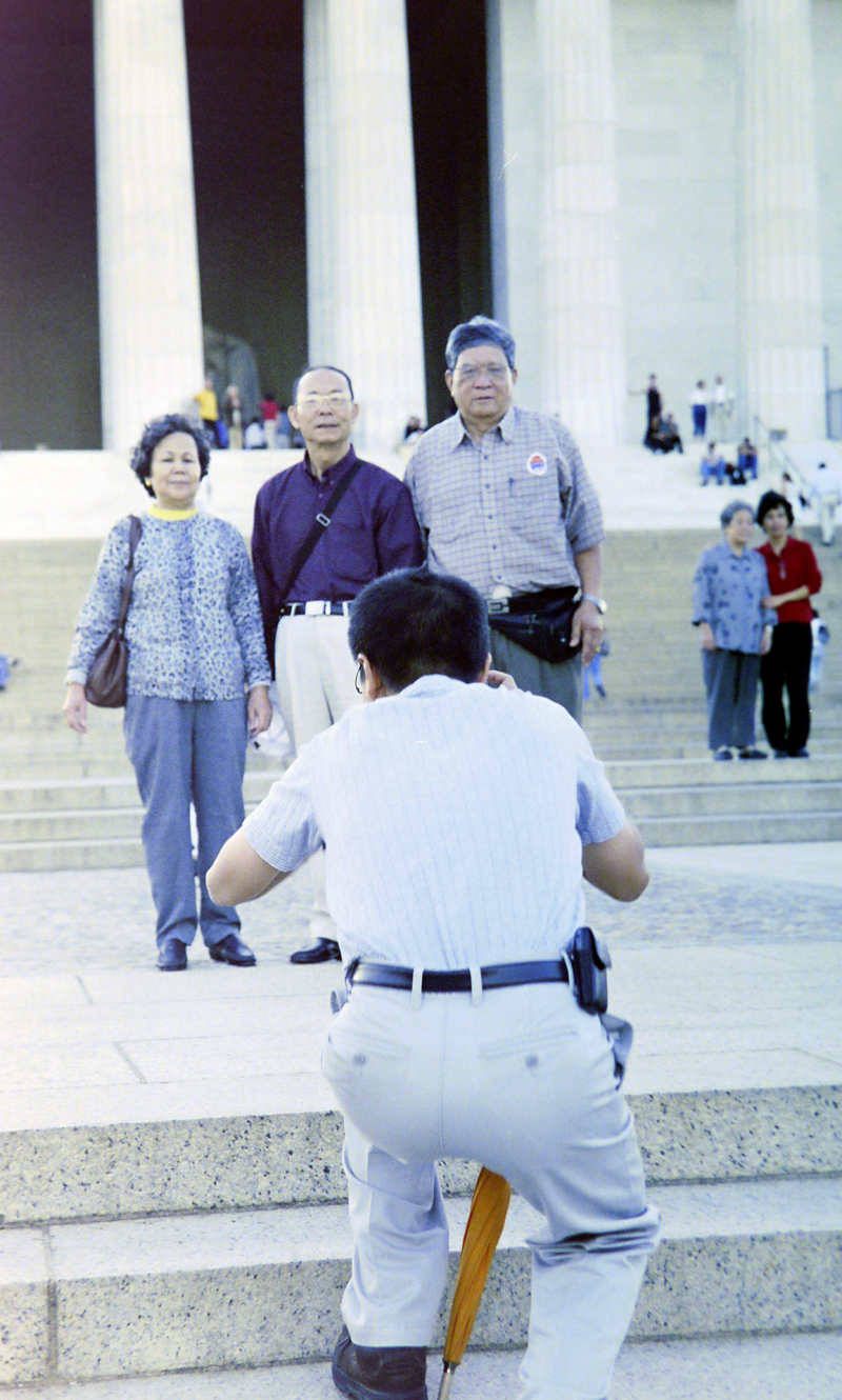 <p>This photo is the beginning of the series: Asians meets Asians in front of a famous sight. Here: Lincoln Memorial in Washington, D.C. Date: 2002.<br />I took this analog picture with my Canon EOS 50E.</p>
